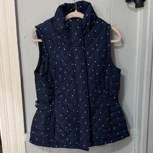 Tommy Hilfiger women's quilted vest in navy with a red and white star print.